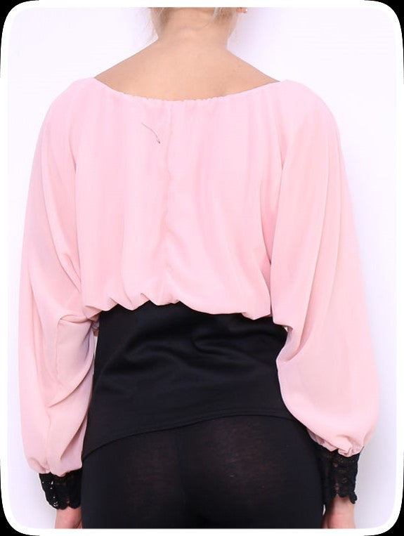 Μπλούζα με λεπτομέρειες δανδέλας και τρουκς