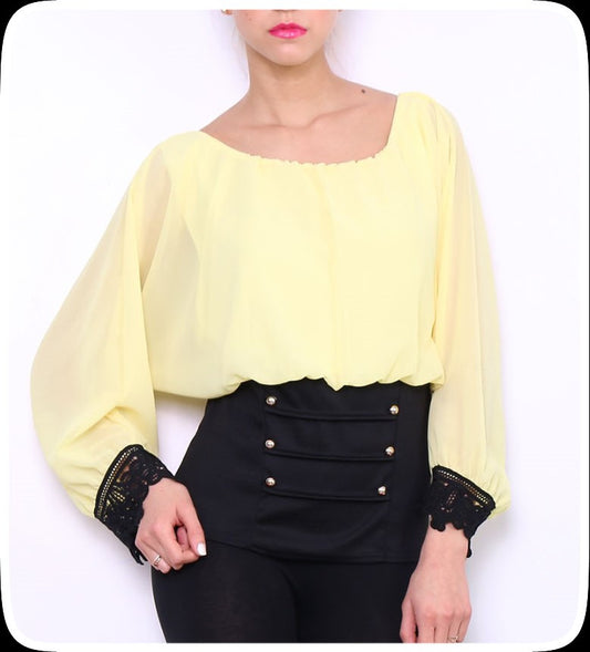 Μπλούζα με λεπτομέρειες δανδέλας και τρουκς